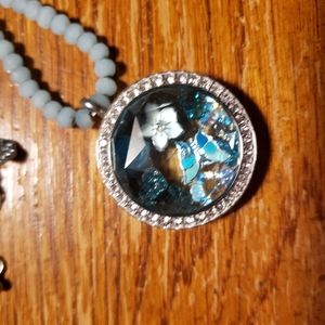 Aqua aura face locket with chain and charms
